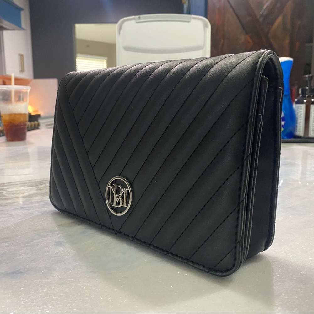 Black leather clutch with shoulder strap